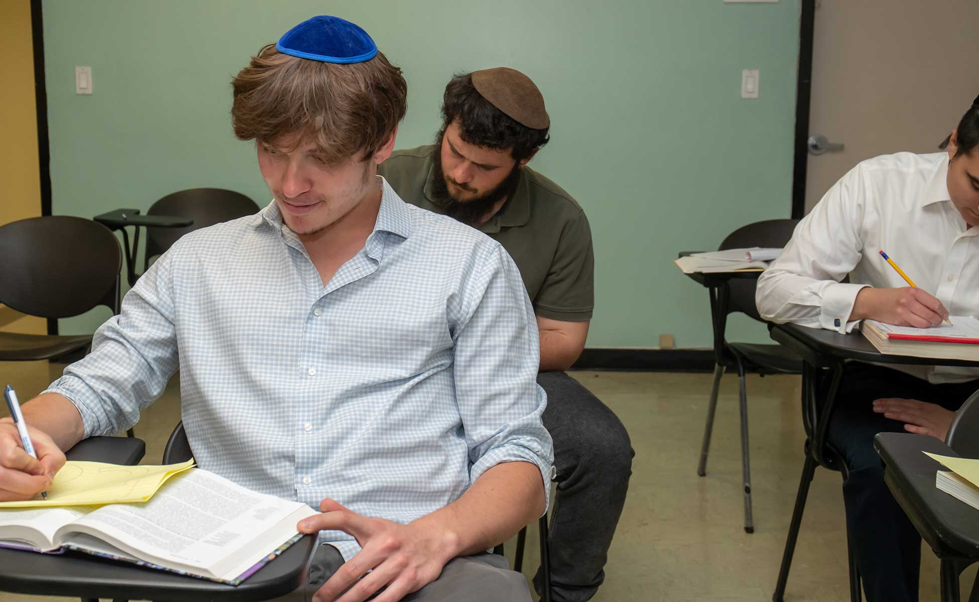 TCLA students studying in class