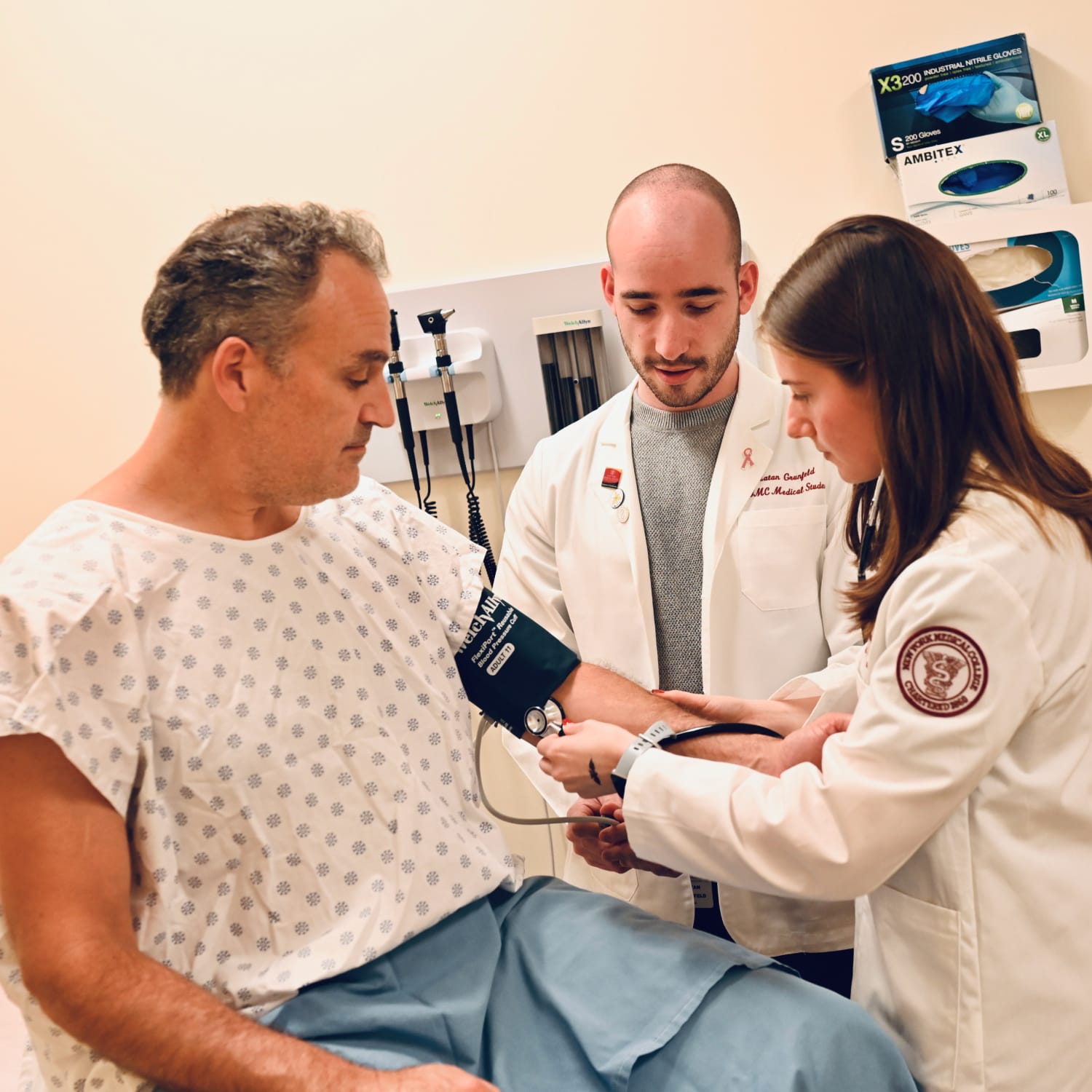 researchers tending to a patient