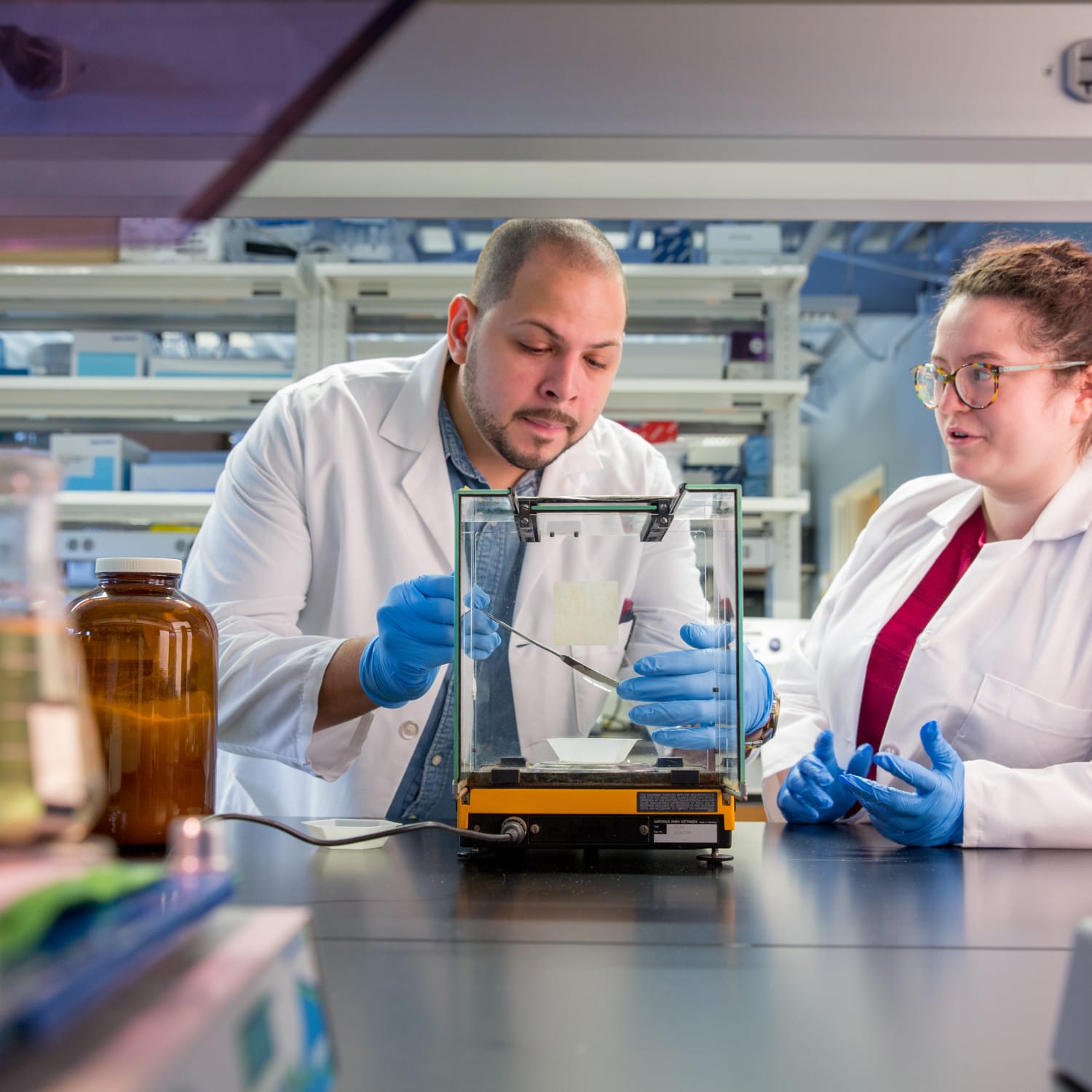 two researchers in an NYMC lab